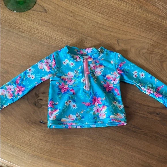 Ruffle Butts toddler long sleeve swim top. Size 12-18 months - Picture 2 of 3